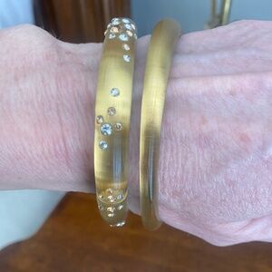 Alexis Bittar gold bracelets
